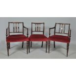 A set of eleven (9+2) late Georgian style mahogany dining chairs with reeded and turned top rails,