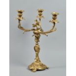 A late 19/early 20c gilt metal rococo three branch candelabrum converted for use as electrolier,