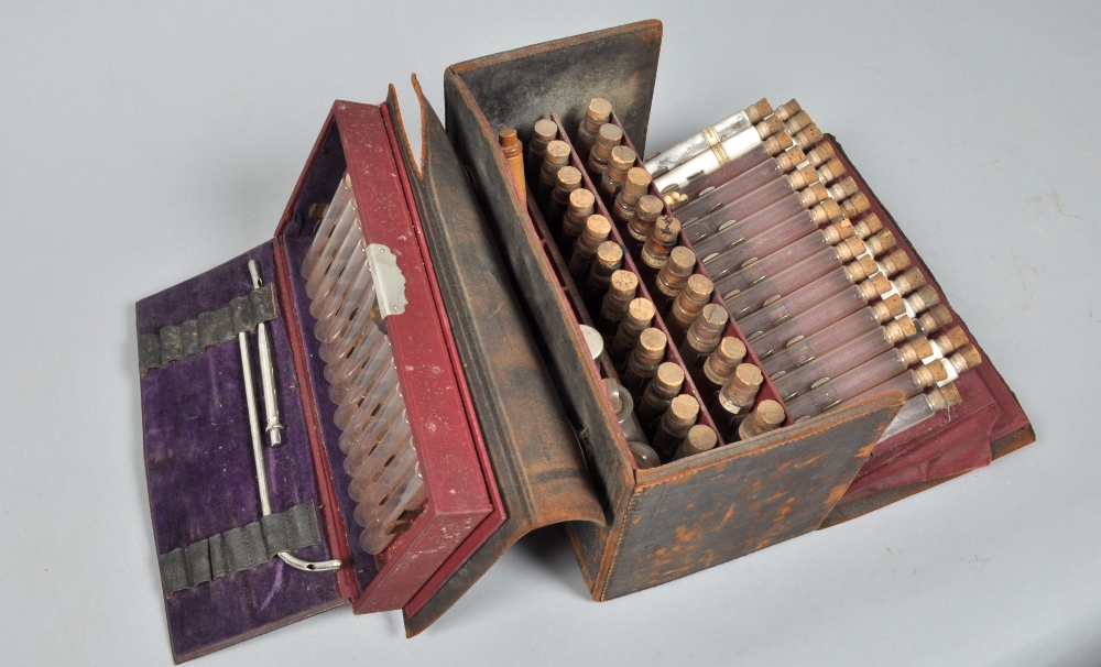 A late 19c doctors or apothecary's travelling chemical chest containing phials and bottles of