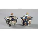 Two Worcester sucriers and covers, each decorated with a Rich Kakiemon design within shaped and