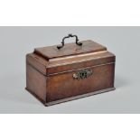 A George III mahogany three compartment tea caddy with spoon division, with a hinged pagoda top,