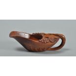 A late 19c/early 20c Swiss carved wood pap boat, 5.5"w.