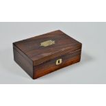 A late Georgian rosewood box with a hinged cover and flush fitting brass carrying handle, a/f, 9"w.