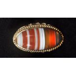 A 9ct gold banded agate ring.