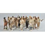 A collection of seventeen 19c North West Indian terracotta miniature figures in costumes of the