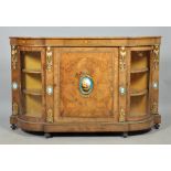 A Victorian figured walnut credenza with line inlay and marquetry decoration, having ormolu