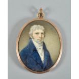 English school circa 1800 - an oval portrait miniature of a gentleman named Mr Oswald, he wearing