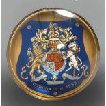 A 1953 Coronation paperweight with royal coat of arms, 3.25"diam.