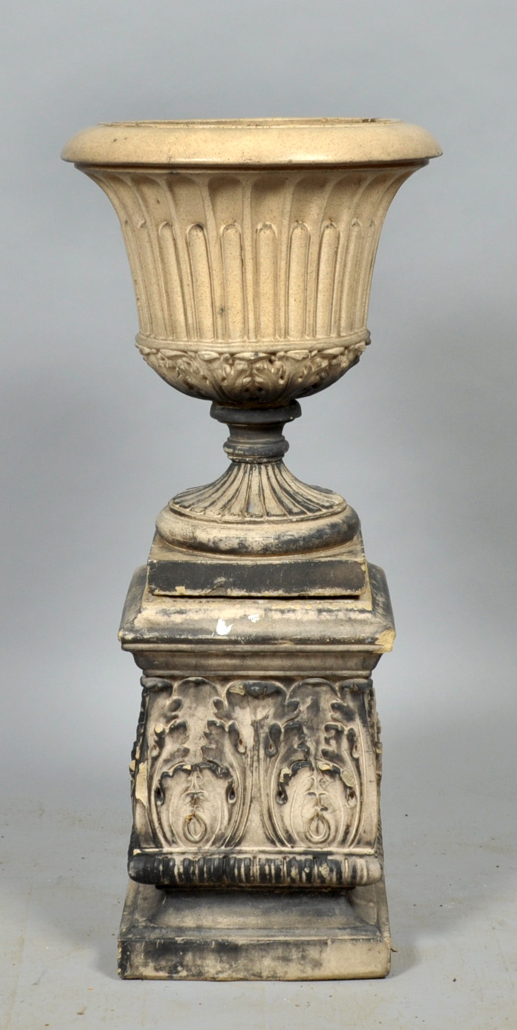 An Art Nouveau stoneware planter on a square plinth manufactured by Lefco Ware, Leeds Fire Clay