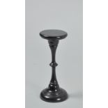 A 19c ebony turned wood candle stand, 6.75"h.