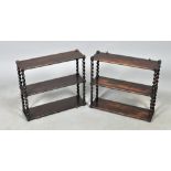 A pair of 19c mahogany wall brackets fitted two shelves with twist carved spindles, 20" x 18.5".