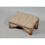 An Arts & Craft upholstered oak kneeler, 20"w.