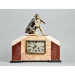 A 1930's French Art Deco mantel clock in geometric case in three colours of marble and surmounted by