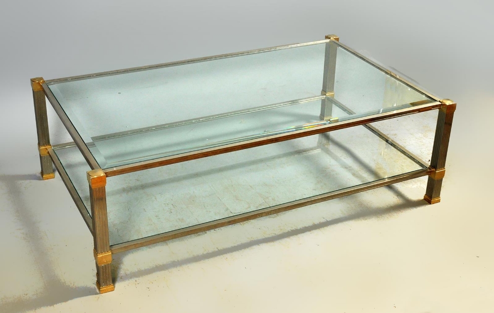 A French Pierrre Vandel two tier glass topped coffee table wtih chromium frame, 15.5"w, 30"deep.