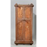 An Arts & Craft oak panel back wall rack, 17"w, 38"h.