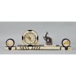 A 1930's Art Deco garniture de cheminee in black and white marble consisting of a central clock