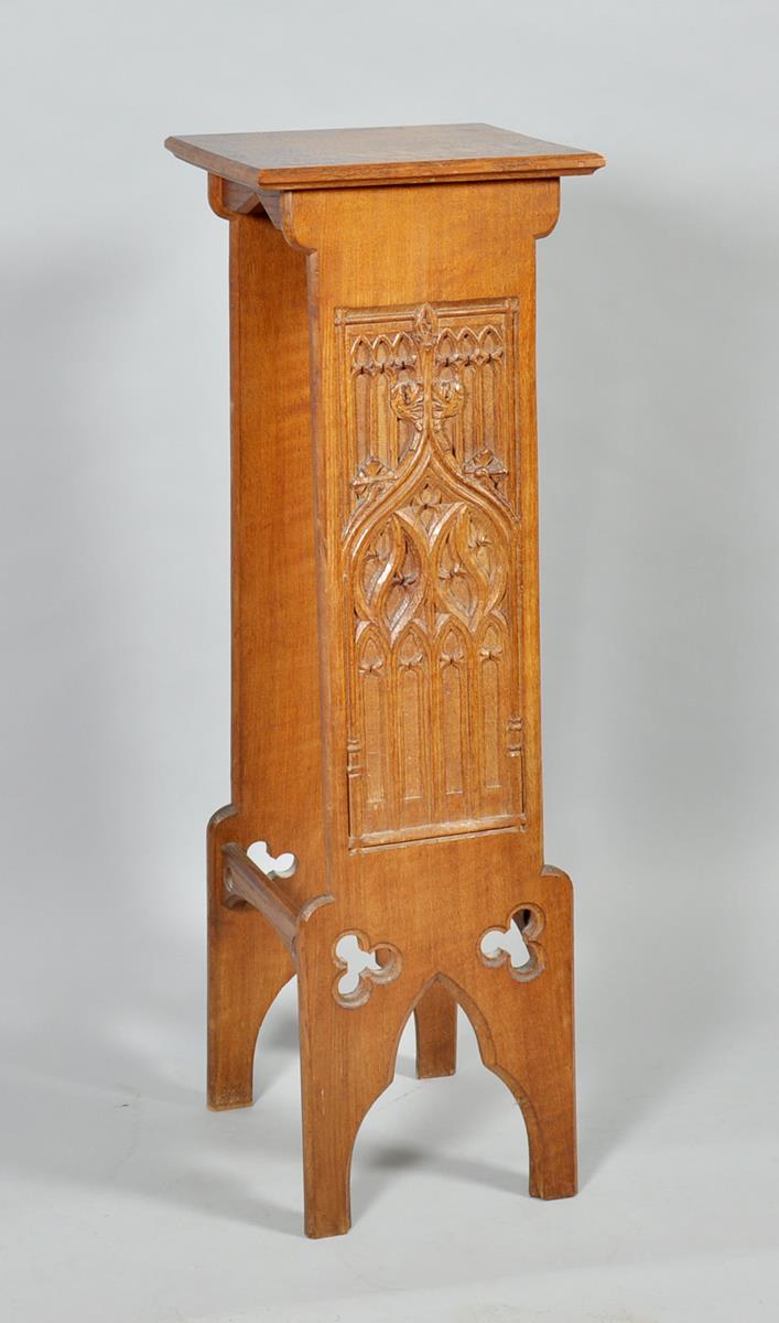 An Arts & Craft oak ecclesiastical lectern with Gothic carved and pierced side panels, 14"w, 42"h.