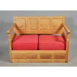 A Colin Beaverman Almack four panel back two seater oak settee, beaver carved, 48"w.