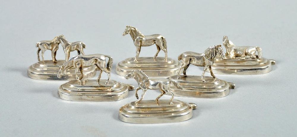 A set of six early 20c Continental silver menu card holders depicting horses, each approximately 1.