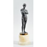 A patinated bronze figure of a young man wearing a loin cloth, supported on an alabaster base, the