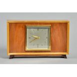 A 1950's English mantel clock by Elliotts. The single train timepiece movement has a barrelled