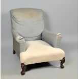 A Howard & Sons early 20c upholstered armchair with rear swept legs, ball and claw front legs, 31"w,