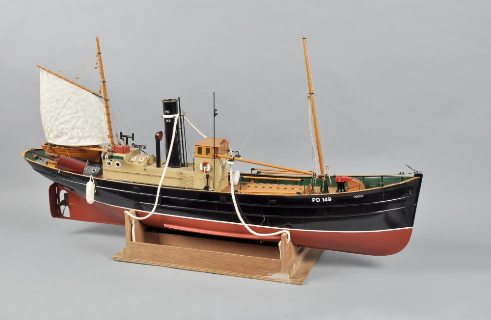 A model trawler , steam powered, manufactured by Marten, Howes & Baylis, 48"w.