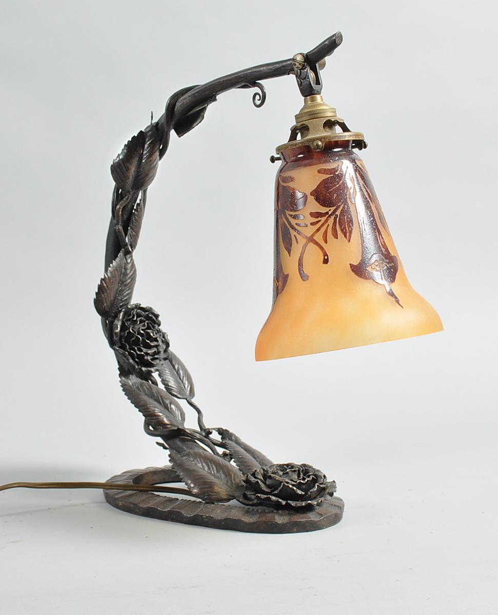 A 1920's French Art Deco Charles Schneider wrought iron desk lamp entwined with rose and leaf,