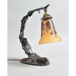 A 1920's French Art Deco Charles Schneider wrought iron desk lamp entwined with rose and leaf,