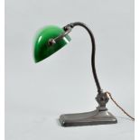 An early 20c desk lamp anodised with green glass shade, 14"h.