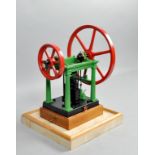 A model of a Victorian vertical steam pump engine, 14"w, 15"h.