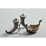 A Norwegian silver Viking ship table salt together with two cornucopia condiments, 3.25"w and 3.5"l.