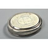 An early 18c tobacco box of oval form, the hinged cover with incised heraldic crest decoration,