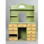 A mid 20c Triang Stores dresser, painted green with yellow drawers, a/f one drawer front missing,