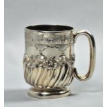 A late Victorian half pint tankard, half writhen lobed and with bold incised and embossed leaf and