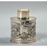 A late Victorian tea caddy with open cartouche, incised foliate and leaf, with lid, London 1900, 3.