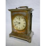 An American mantel clock with circular dial by Seth Thomas in plated rectangular case