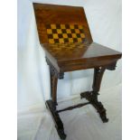 A Victorian walnut rectangular turnover top games table with inset chess board top, single drawer in