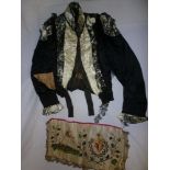 A ladies old silk and black lace jacket with beadwork decoration by Loye of St. Austell and a 19th