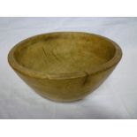 A 19th century turned wood circular bowl 14" diameter