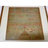 A 19th century needlework rectangular sampler depicting alphabet and numbers by E. Wardle aged 11