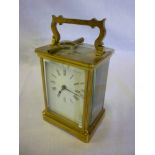 A good quality French carriage clock with rectangular enamelled dial in brass traditional-style case