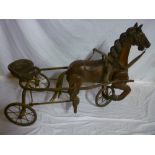 An  unusual Victorian-style carved wood horse tricycle, the trotting horse with articulate legs, 24"