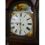 A 19th century longcase clock with 12" painted arched dial and 8 day movement in polished oak