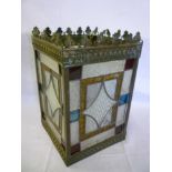 An Edwardian brass square light shade with coloured glass panels