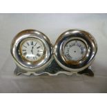 A good quality Edwardian silver cased clock and barometer set comprising a mantel clock with