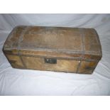 A 19th century rectangular domed travelling trunk covered with pony/deer skin and metal bands