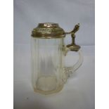 A German glass half litre tankard with silver mounted hinged lid and mounts