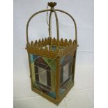 An Edwardian brass square hanging light shade with leaded glass panels (af)
