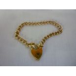 A 9ct gold chain link bracelet with 9ct padlock clasp